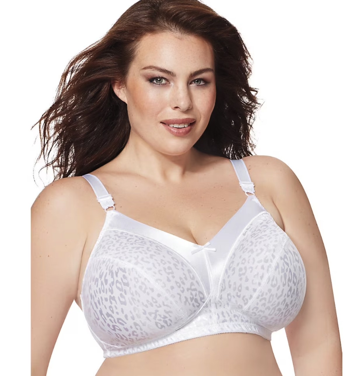 Plus-size model wearing a white wireless bra with animal print jacquard cups and satin center panel